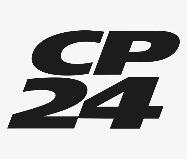 Military helicopter crew conducts rescue from cargo ship